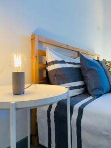 A bed or beds in a room at Via Marina