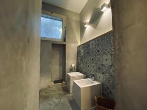 A bathroom at Via Marina