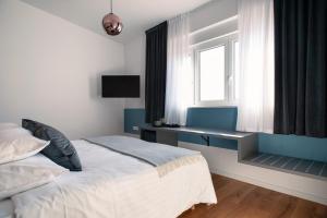 Postel nebo postele na pokoji v ubytování Guesthouse Frlan