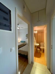 Кровать или кровати в номере Ageliki's Athens Apartment