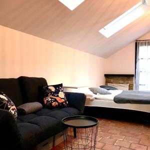 Un pat sau paturi într-o cameră la Boutique Apartments Felicino údolí