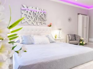 Posteľ alebo postele v izbe v ubytovaní ELEGANT SUITE - in centro PortaNuova