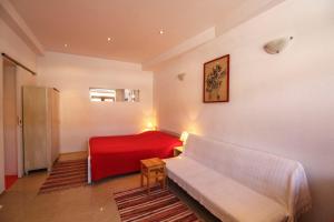 Posteľ alebo postele v izbe v ubytovaní Beachfront Love Nest