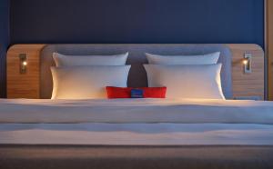 Postel nebo postele na pokoji v ubytování Holiday Inn Express Berlin City Centre by IHG