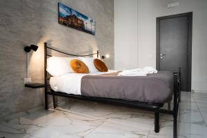 Postel nebo postele na pokoji v ubytování San Felice Palace