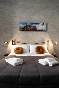 Postel nebo postele na pokoji v ubytování San Felice Palace