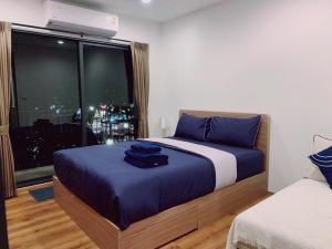 Postel nebo postele na pokoji v ubytování Hua Hin La Habana 59 + 28 fotografií