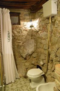 Kylpyhuone majoituspaikassa Casa Antica