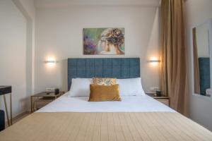 Кровать или кровати в номере Alcmene Lux Apartment by "elite"