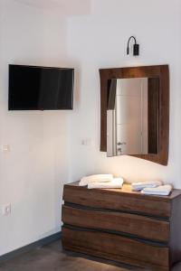 A bed or beds in a room at Ioulia`s Apartments