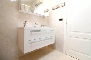 Фотография из галереи CasaViva - Central Seaview Penthouse in Camogli в Камольи +13 фотографий