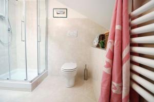 Ванная комната в CasaViva - Central Seaview Penthouse in Camogli