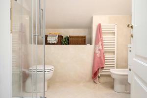Ванная комната в CasaViva - Central Seaview Penthouse in Camogli