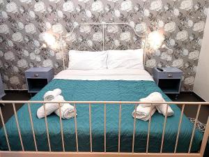 Postel nebo postele na pokoji v ubytování kasakora