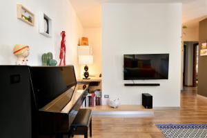 A television and/or entertainment centre at Family House