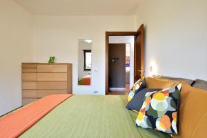 A bed or beds in a room at Family House