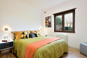 A bed or beds in a room at Family House