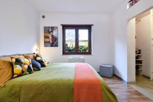 A bed or beds in a room at Family House