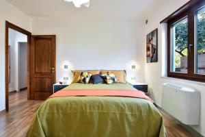A bed or beds in a room at Family House
