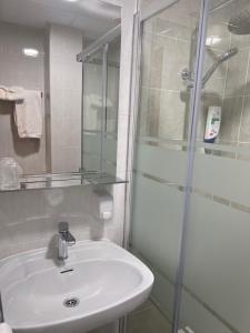 Koupelna v ubytování Hostal Avenida