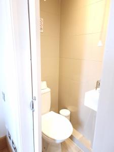 a small bathroom with a toilet and a shower at F204-Compact 2nd Flr Studio Fits 2-Near Hyde Park in London