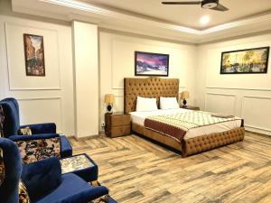 Katil atau katil-katil dalam bilik di Executive Apartments In Bahria Heights