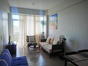 O zonă de relaxare la New Paradise Ocean View Apartment (DOT accredited)