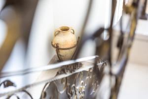 a vase sitting on a shelf in a rack at Grand Hotel Park in Dubrovnik