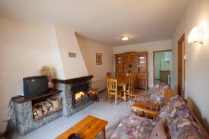 Posezení v ubytování Apartaments Castellar de n'Hug