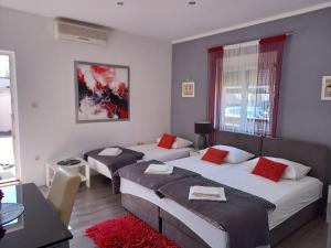 Posteľ alebo postele v izbe v ubytovaní Apartments Benic