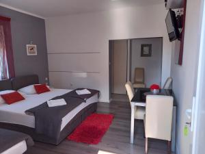Posteľ alebo postele v izbe v ubytovaní Apartments Benic