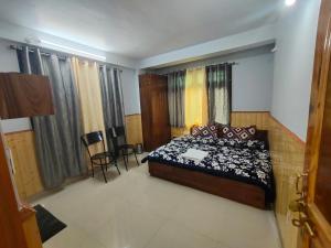 Postel nebo postele na pokoji v ubytování KAILASH VIEW SARAHAN