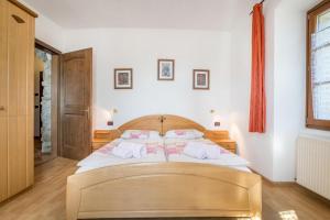 Łóżko lub łóżka w pokoju w obiekcie Residence Lena App 4