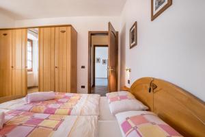 Łóżko lub łóżka w pokoju w obiekcie Residence Lena App 4