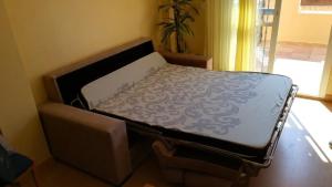 מיטה או מיטות בחדר ב-Torrox Costa