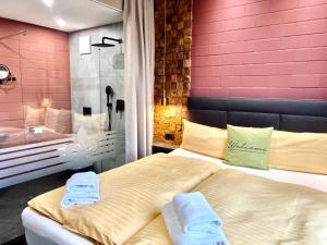 מיטה או מיטות בחדר ב-Zweirad Hotel Lenne
