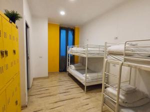 A bed or beds in a room at QUO Milano