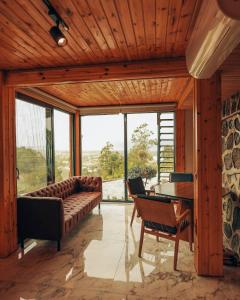 a living room with a couch and a table at Sapanca Casamia Suit in Sapanca