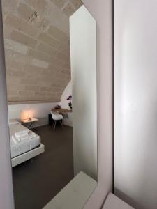 Postel nebo postele na pokoji v ubytování Il Giramondo Suite&Room self check-in