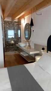 A bed or beds in a room at Relais Sant'Anna