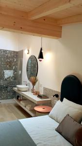 A bed or beds in a room at Relais Sant'Anna