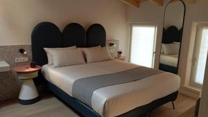 A bed or beds in a room at Relais Sant'Anna