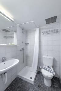 Koupelna v ubytování Hotel Hermes