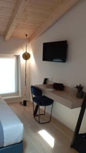 A television and/or entertainment centre at Relais Sant'Anna