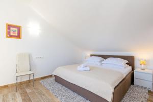 Postel nebo postele na pokoji v ubytování Villa Rubea