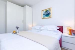 Postel nebo postele na pokoji v ubytování Villa Rubea