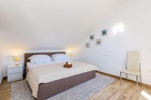 Postel nebo postele na pokoji v ubytování Villa Rubea
