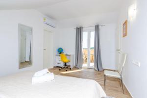 Postel nebo postele na pokoji v ubytování Villa Rubea