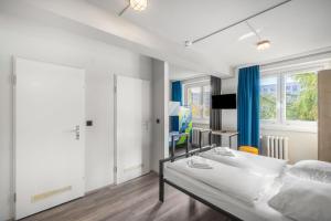 Ένα ή περισσότερα κρεβάτια σε δωμάτιο στο a&o Dresden Hauptbahnhof