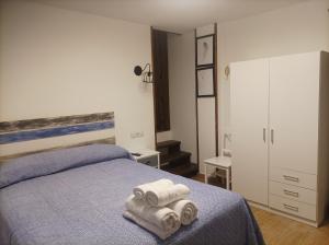 Postel nebo postele na pokoji v ubytování Casa La Piedra